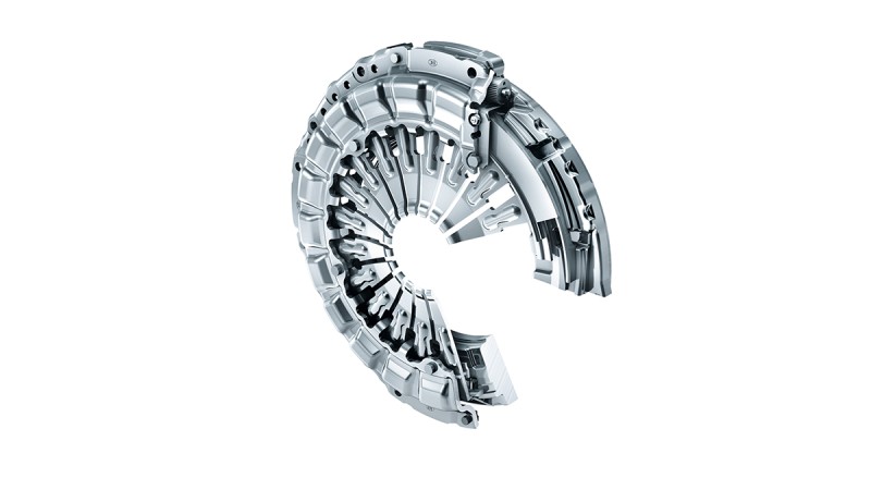 Travel adjusted clutch (TAC)